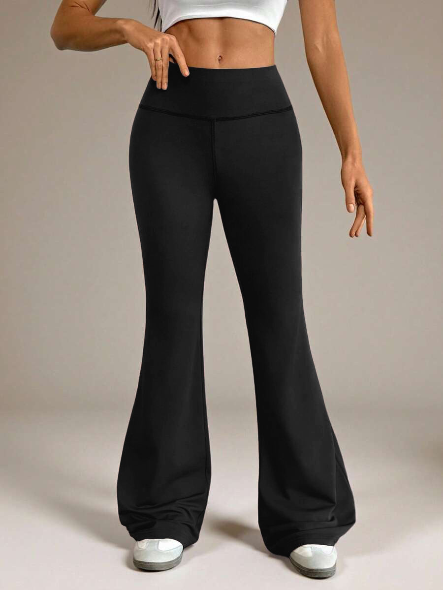 Pantalones de yoga de cintura alta y corte bota para mujer